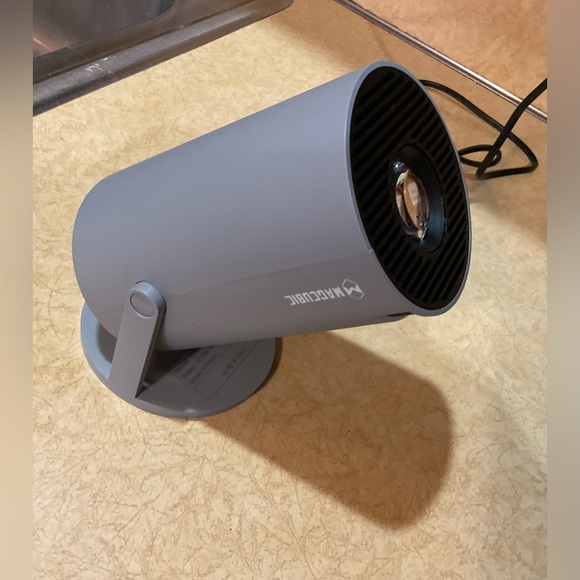 Magic Cube: Smart portable mini projector with batteries remote and cord case. - Picture 5 of 8